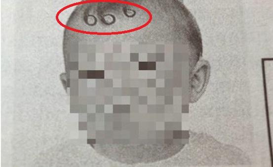 Anunț DEMENT într-un ziar central, însoțit de fotografia unui copil marcat cu 666: 