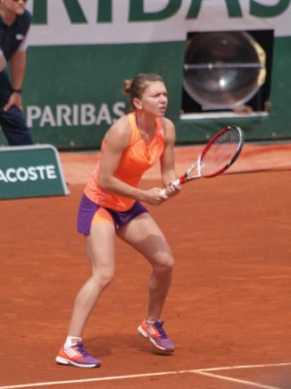 Halep a ajuns deja la Singapore