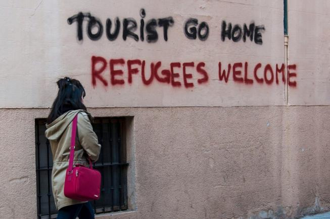 Revoltă pe insula Mallorca: „Turiști, plecați acasă! Refugiații sunt bineveniți“