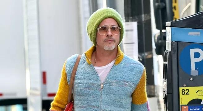 Pantaloni din lână și pulovere rupte: ce ne spune Brad Pitt cu look-ul său „anti-Brad” (foto)
