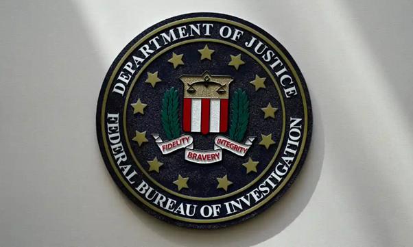 Agenții FBI au arestat un agent de pază după ce acesta a aplicat la un job de asasin plătit
