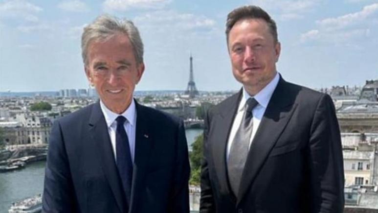 Cei mai bogați doi oameni din lume s-au întâlnit la Paris: 426 miliarde într-o imagine