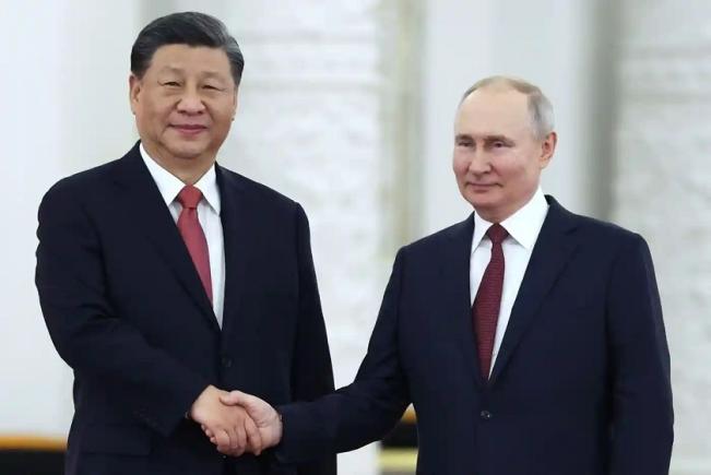 Vladimir Putin va vizita China în perioada 16-17 mai 