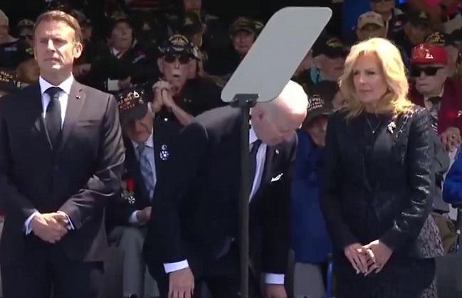 Biden a încercat să se așeze pe un scaun care nu exista în timpul ceremoniei din Normandia (video)
