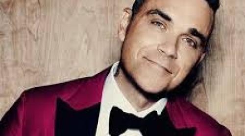 Robbie Williams vine la Untold