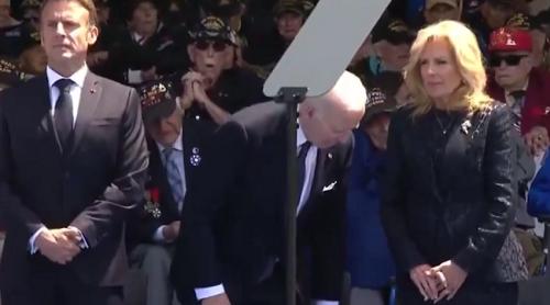 Biden a încercat să se așeze pe un scaun care nu exista în timpul ceremoniei din Normandia (video)