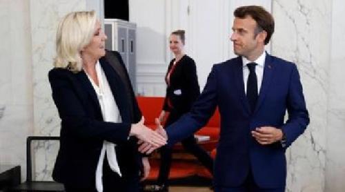 Dușmani ieri, aliați astăzi: Macron și Le Pen au orchestrat în secret numirea primului ministru Michel Barnier